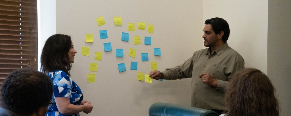 Healthcare influencer marketing team reviewing criteria during a vetting and evaluation session.